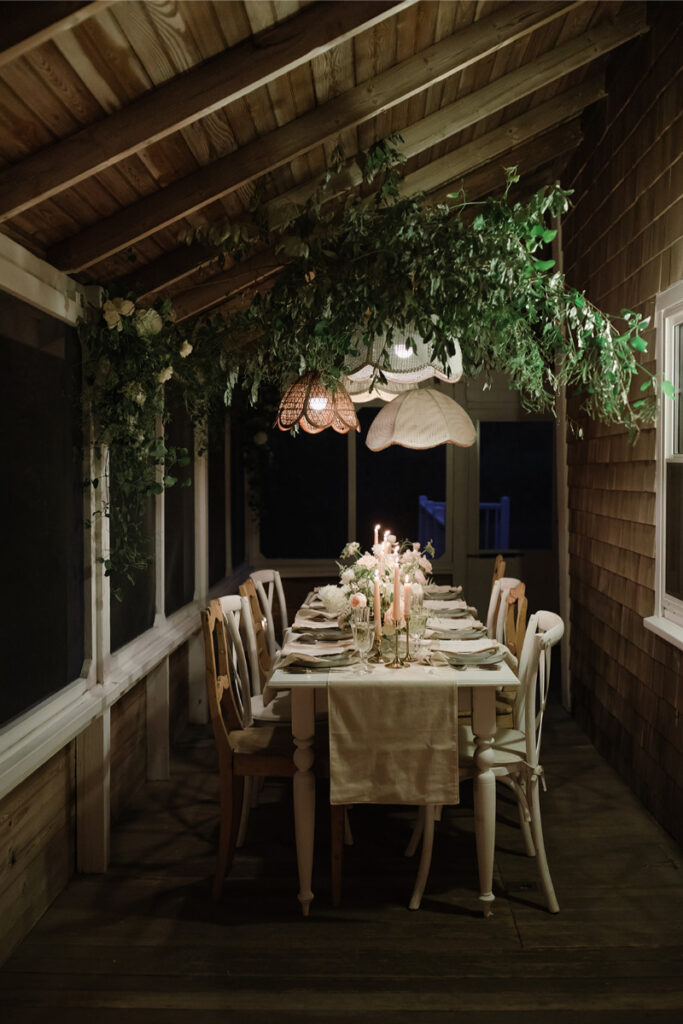 floral chandelier wedding design above a wedding tablecape