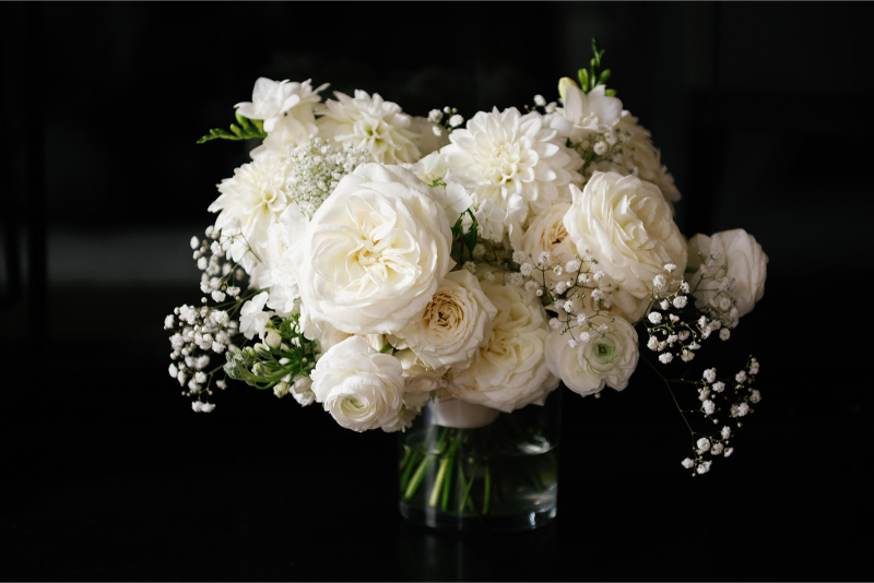 Monochromatic bridal bouquet with white flowers. 