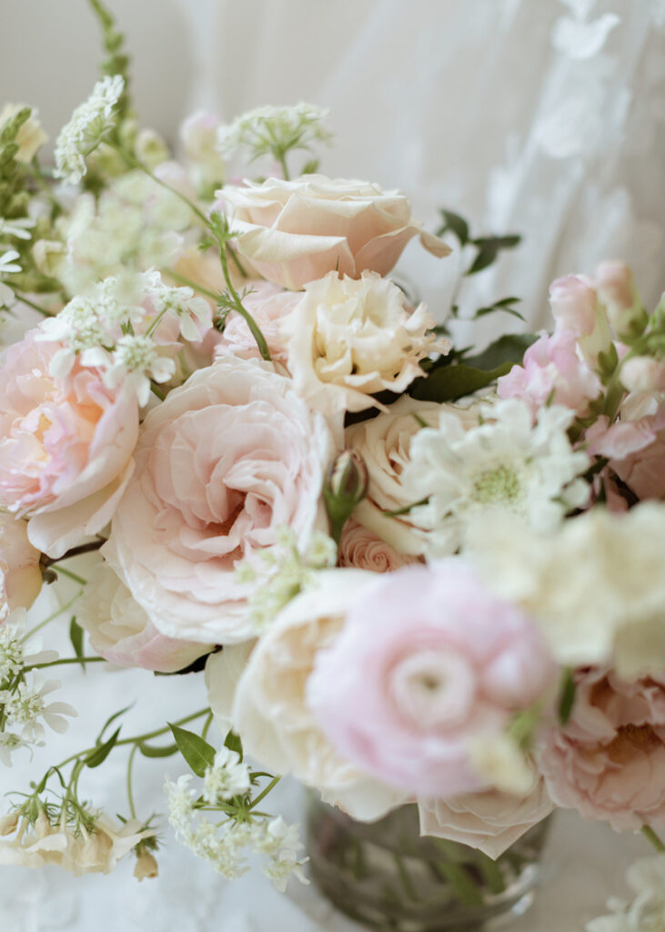 Early Spring seasonal flower centerpiece featuring subtle pink hues