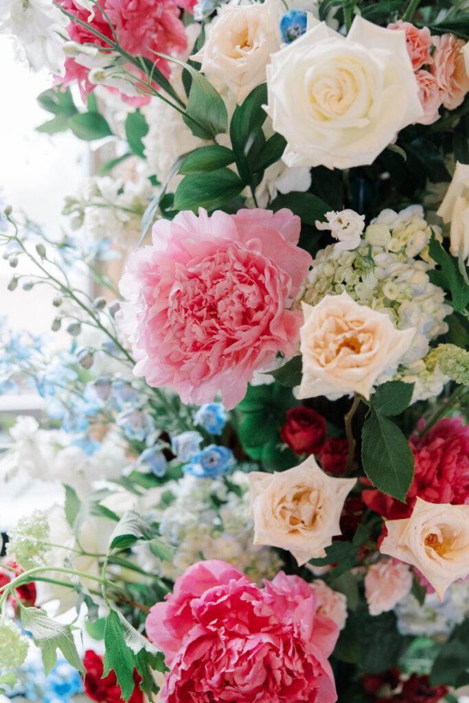 Close up of an wedding flower installment using early summer seasonal flowers from local New England farms. 