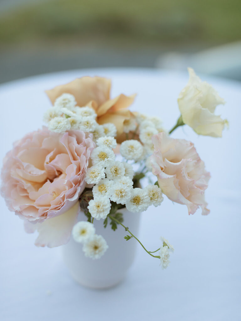 Small floral wedding centerpiece using local and seasonal pink and white flowers in New England. 