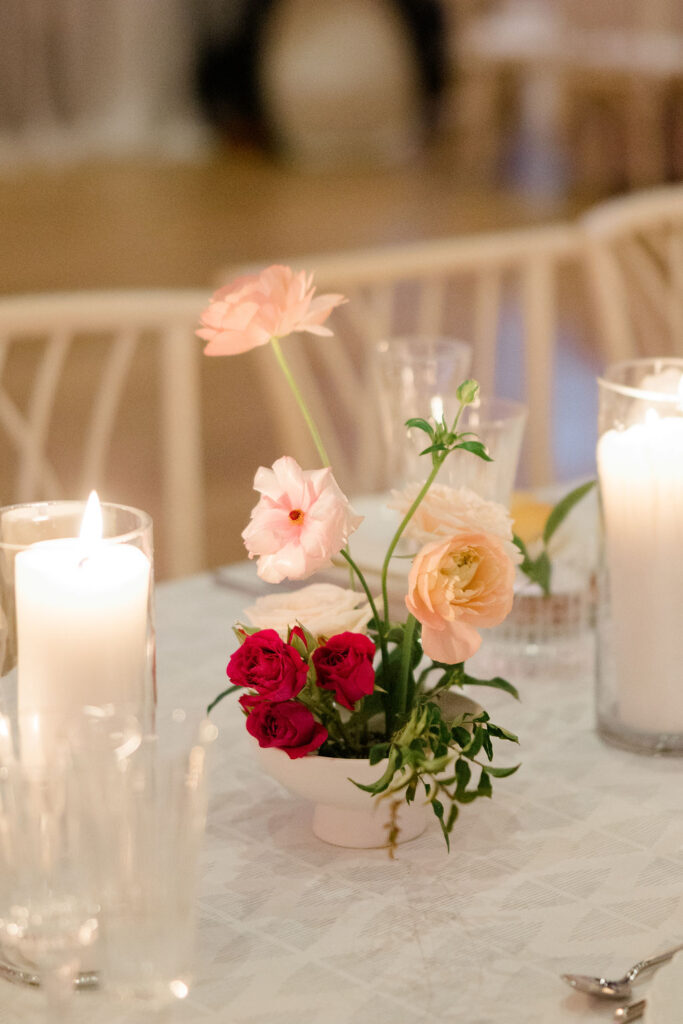 red and pink pin frog floral centerpiece