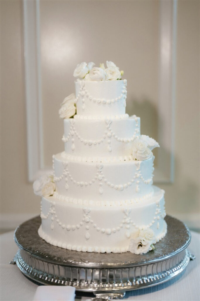 Four tier wedding cake at the Boston Harbor Hotel