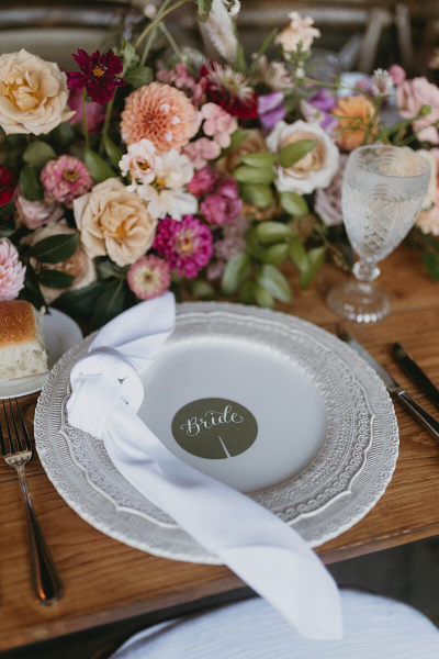 personalized table settings at the wedding reception at glen manor house 